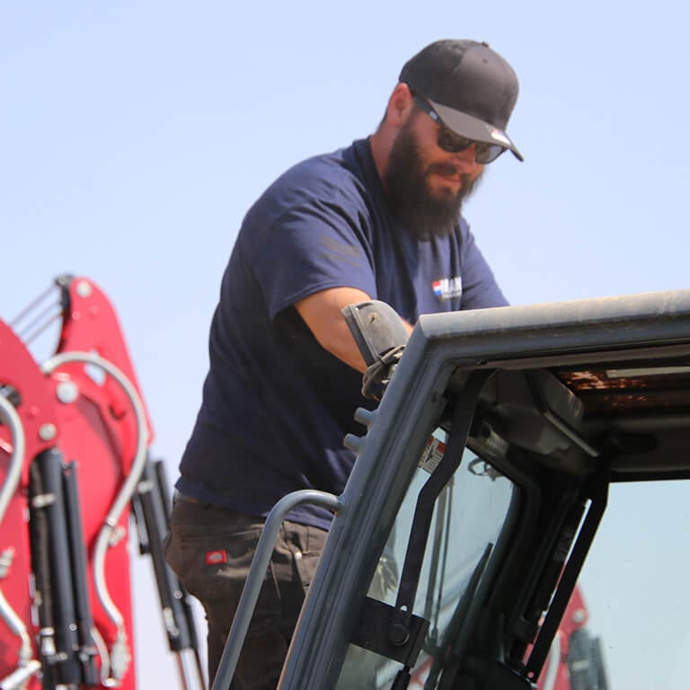 Staff maintaining equipment